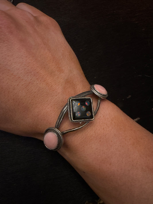 Dice & pink conch cuff